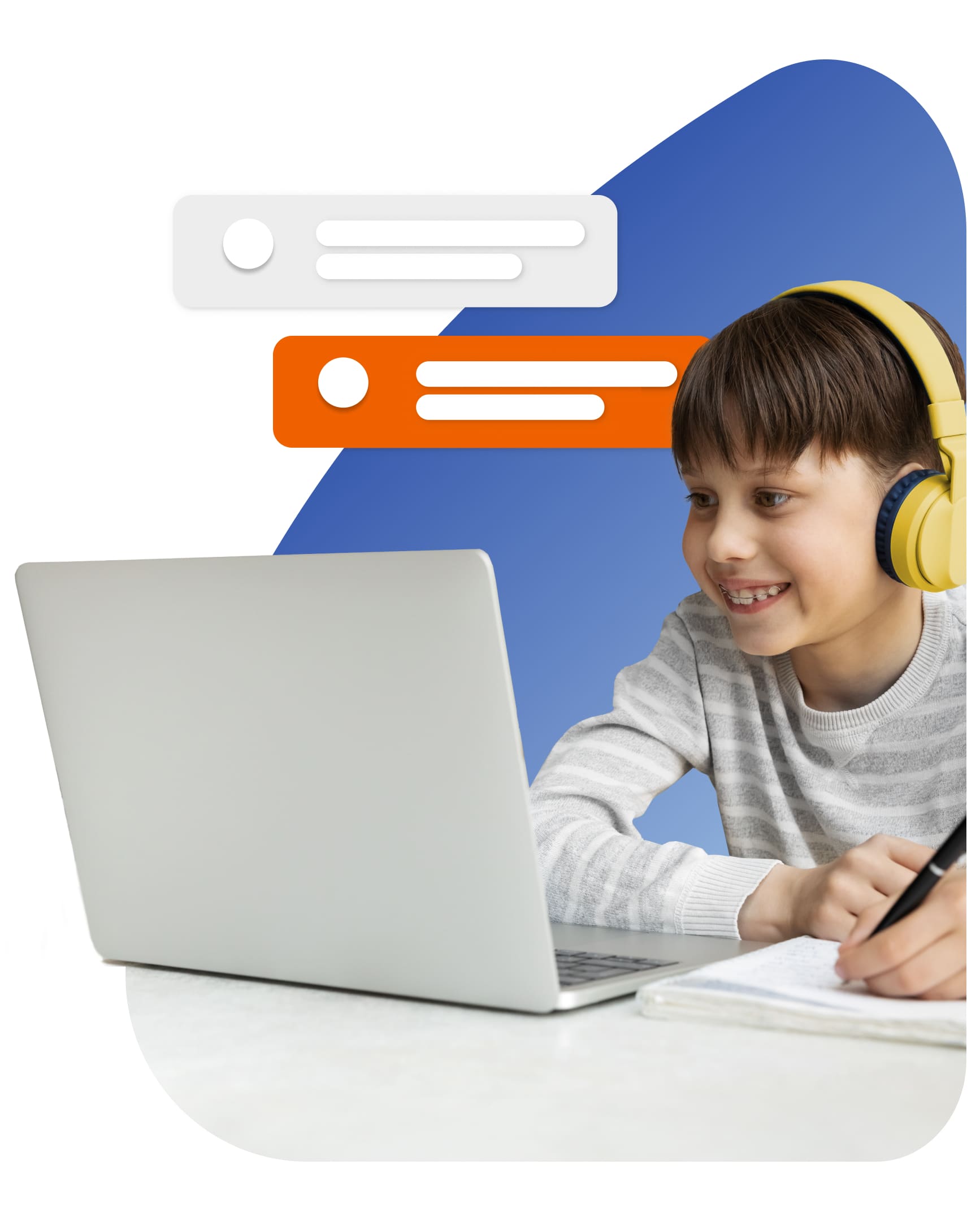 A young boy wearing headphones is focused on his laptop, immersed in his digital experience.