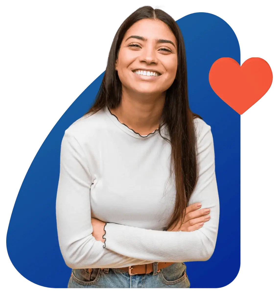 A woman smiling with her arms crossed, standing in front of a heart symbol, exuding warmth and positivity.