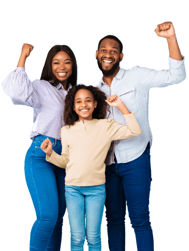 A family of three joyfully raises their arms together, celebrating a moment of happiness and unity.