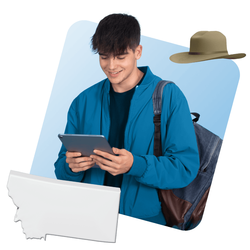 A young man in a blue jacket and hat uses a tablet while holding a backpack, focused on his device outdoors.